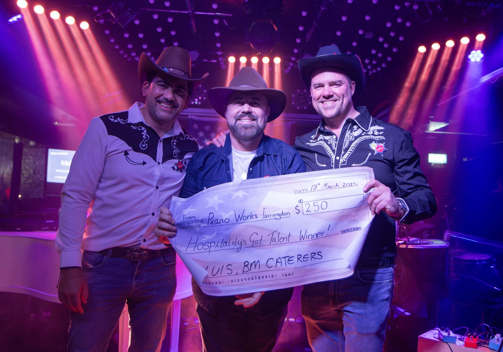 Luis Henrique Pires De Avila collecting his winner's cheque at Hospitality's Got Talent 2025